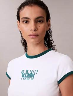 Calvin Klein Baby-T-Shirt mit 1968-Logo-Grafik^Damen T-shirts & Tops