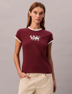 Calvin Klein Baby-T-Shirt mit 1968-Logo-Grafik^Damen T-shirts & Tops