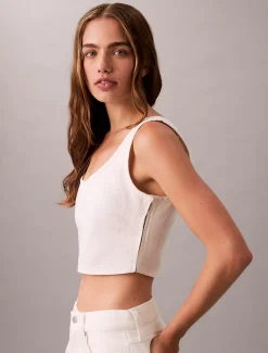 Calvin Klein Cropped Tanktop aus Denim mit durchgehendem Monogramm^Damen T-shirts & Tops