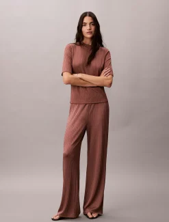 Calvin Klein Glänzende gerippte Hose zum Reinschlüpfen^Damen Hosen & Shorts