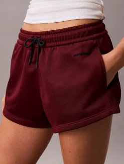Calvin Klein Hochglanz-Mini-Shorts aus Frottee^Damen Hosen & Shorts