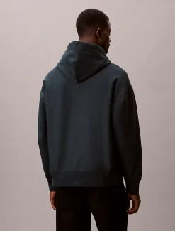 Calvin Klein Hoodie aus Premium-Fleece mit Calvin-Grafik^Herren Hoodies & Sweatshirts