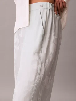 Calvin Klein Hose aus Viskose-Jacquard mit Blumenmuster^Damen Hosen & Shorts