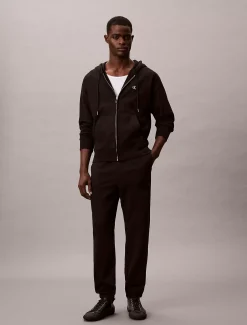 Calvin Klein Jogginghose aus Fleece mit Monogramm-Logoaufnäher^Herren Hosen & Shorts