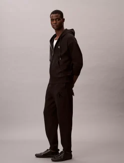 Calvin Klein Jogginghose aus Fleece mit Monogramm-Logoaufnäher^Herren Hosen & Shorts