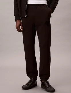 Calvin Klein Jogginghose aus Fleece mit Monogramm-Logoaufnäher^Herren Hosen & Shorts