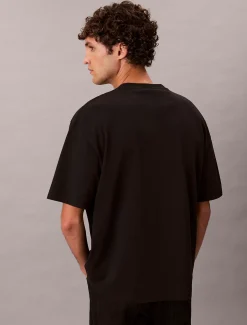 Calvin Klein Kate Moss Lässiges T-Shirt mit Grafik^Herren T-shirts