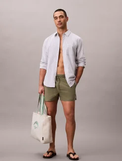 Calvin Klein Kurze Badeshorts mit Kordelzug - Logo Tape^Herren BademodeFrisch Eingetroffen