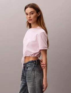 Calvin Klein Kurzes Logo-T-Shirt mit Bindegürtel^Damen T-shirts & Tops