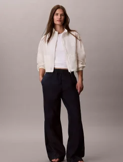 Calvin Klein Lässige Tech-Denim-Hose^Damen High Rise Skinny|Relaxed Boot