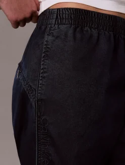 Calvin Klein Lässige Tech-Denim-Hose^Damen High Rise Skinny|Relaxed Boot