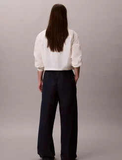 Calvin Klein Lässige Tech-Denim-Hose^Damen High Rise Skinny|Relaxed Boot