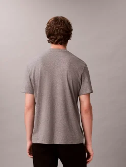 Calvin Klein Lässiges T-Shirt mit grafischem Varsity-Logo^Herren T-shirts