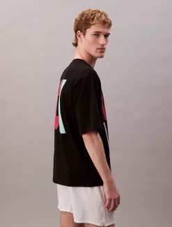 Calvin Klein Marc Hundley Pride Viva Love lässiges T-Shirt mit grafischem Print^Herren T-shirts