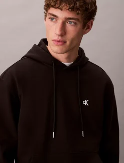 Calvin Klein Monogramm-Hoodie aus Baumwoll-Frottee^Herren Hoodies & Sweatshirts