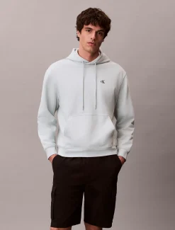 Calvin Klein Monogramm-Hoodie aus Baumwoll-Frottee^Herren Hoodies & Sweatshirts