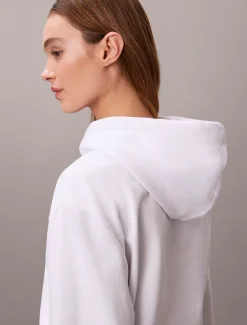 Calvin Klein Monogramm-Hoodie aus Baumwoll-Frottee^Damen Sweatshirts & Hoodies