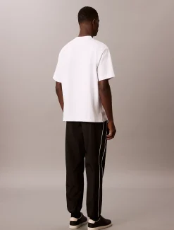 Calvin Klein Trainingshose aus Nylon mit relaxter Passform^Herren Hosen & Shorts