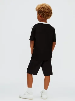 Calvin Klein T-Shirt im Blockfarben-Design mit Tape-Detail^Kinder T-shirts|Kleidung