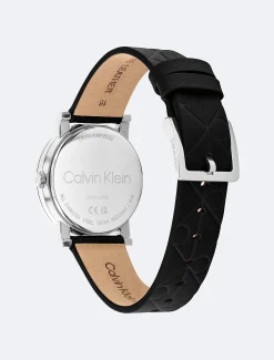 Calvin Klein Uhr mit Lederarmband und durchgehendem Monogramm^Damen Uhren & Schmuck